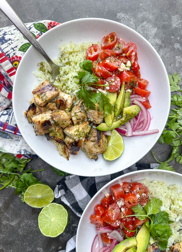 Fresh, zesty, and perfect for meal prep, these Cilantro Lime Chicken Bowls from Jessica Merchant's Easy Everyday Cookbook are a weeknight game-changer! Packed with flavor, easy to assemble, and great for leftovers. Save this one!