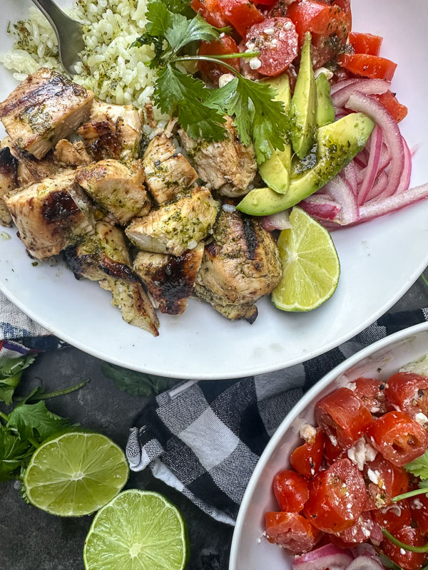 Fresh, zesty, and perfect for meal prep, these Cilantro Lime Chicken Bowls from Jessica Merchant's Easy Everyday Cookbook are a weeknight game-changer! Packed with flavor, easy to assemble, and great for leftovers. Save this one!