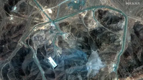 Maxar Technologies/Handout via Reuters Satellite image shows an overview of the Fordo nuclear facility in Iran on 22 June