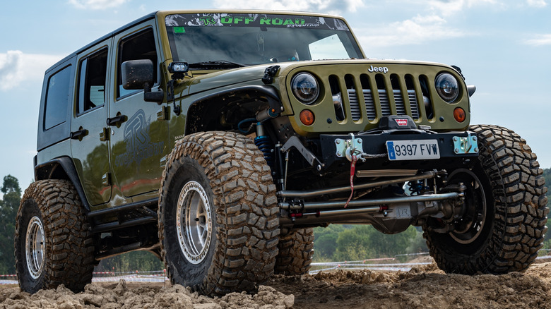 A Jeep parked off-road.