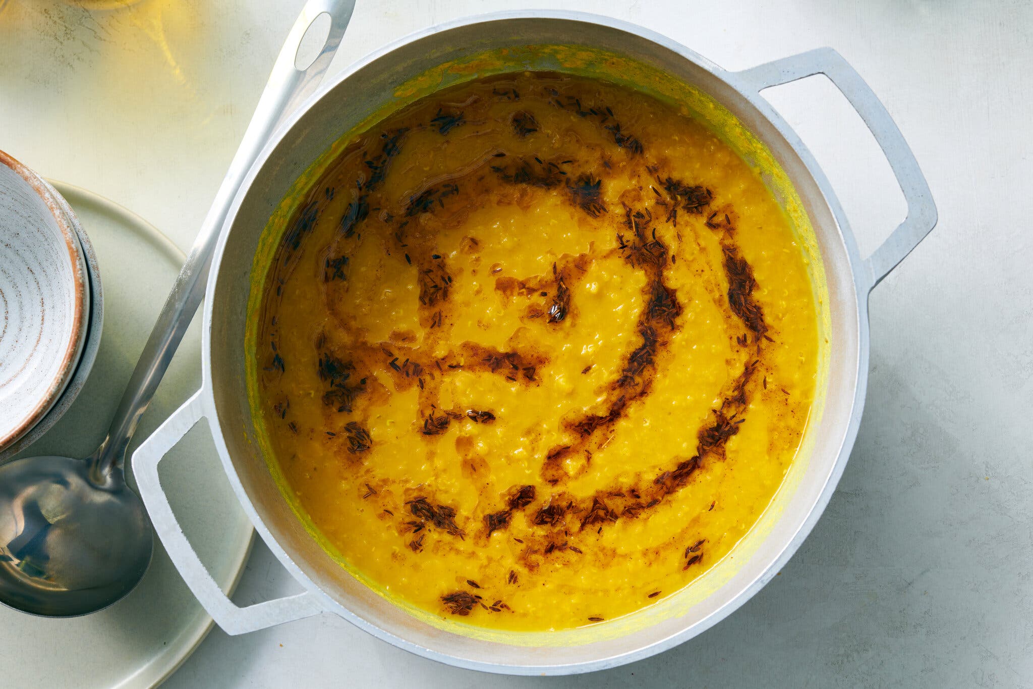 An overhead image of everyday dal in a Dutch oven.