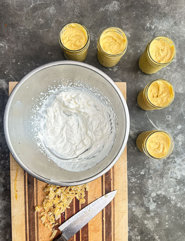 Creamy Ginger Pumpkin Mousse made with pumpkin, warm spices, fresh ginger, and homemade whipped cream. An easy, egg-free fall dessert perfect for Thanksgiving.